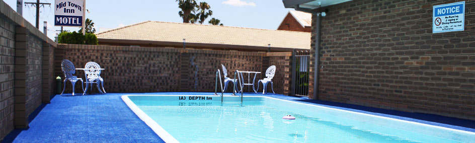Relax by the pool at Mid Town Inn Narrabri